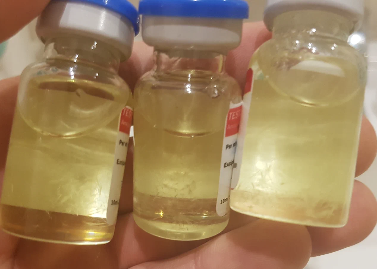 3 horizontally adjacent crystalized vials.